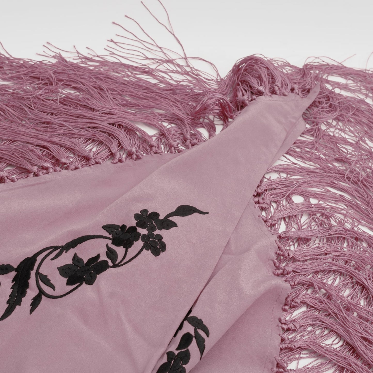 Rose and black floral embroidered mantoncillo shawl in crespon.