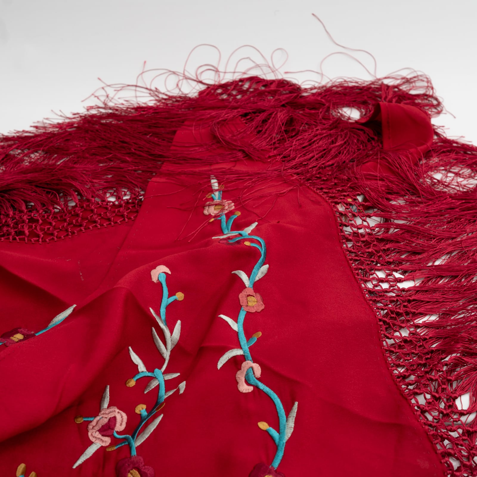 Red floral embroidered detail