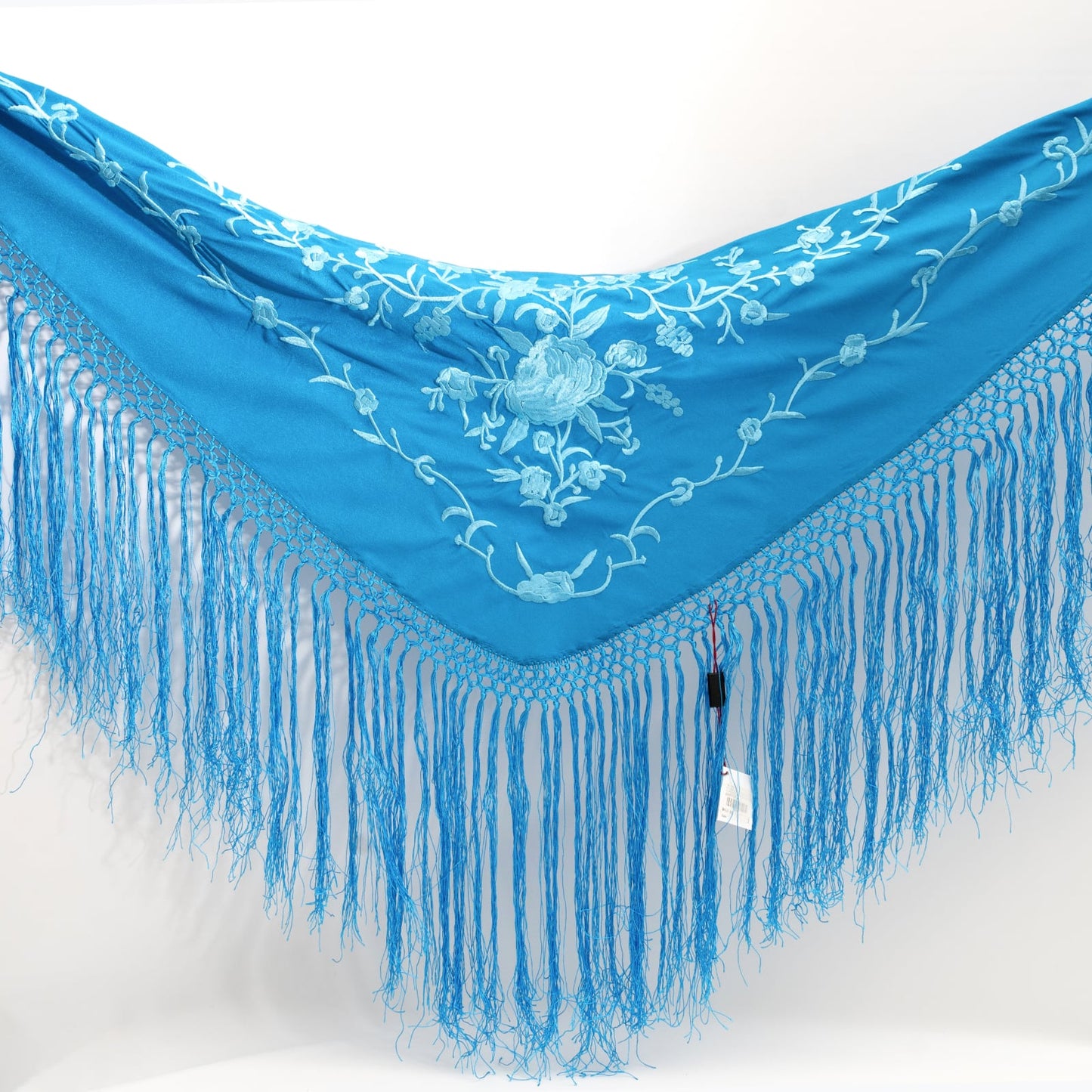 Blue floral embroidered mantoncillo shawl.