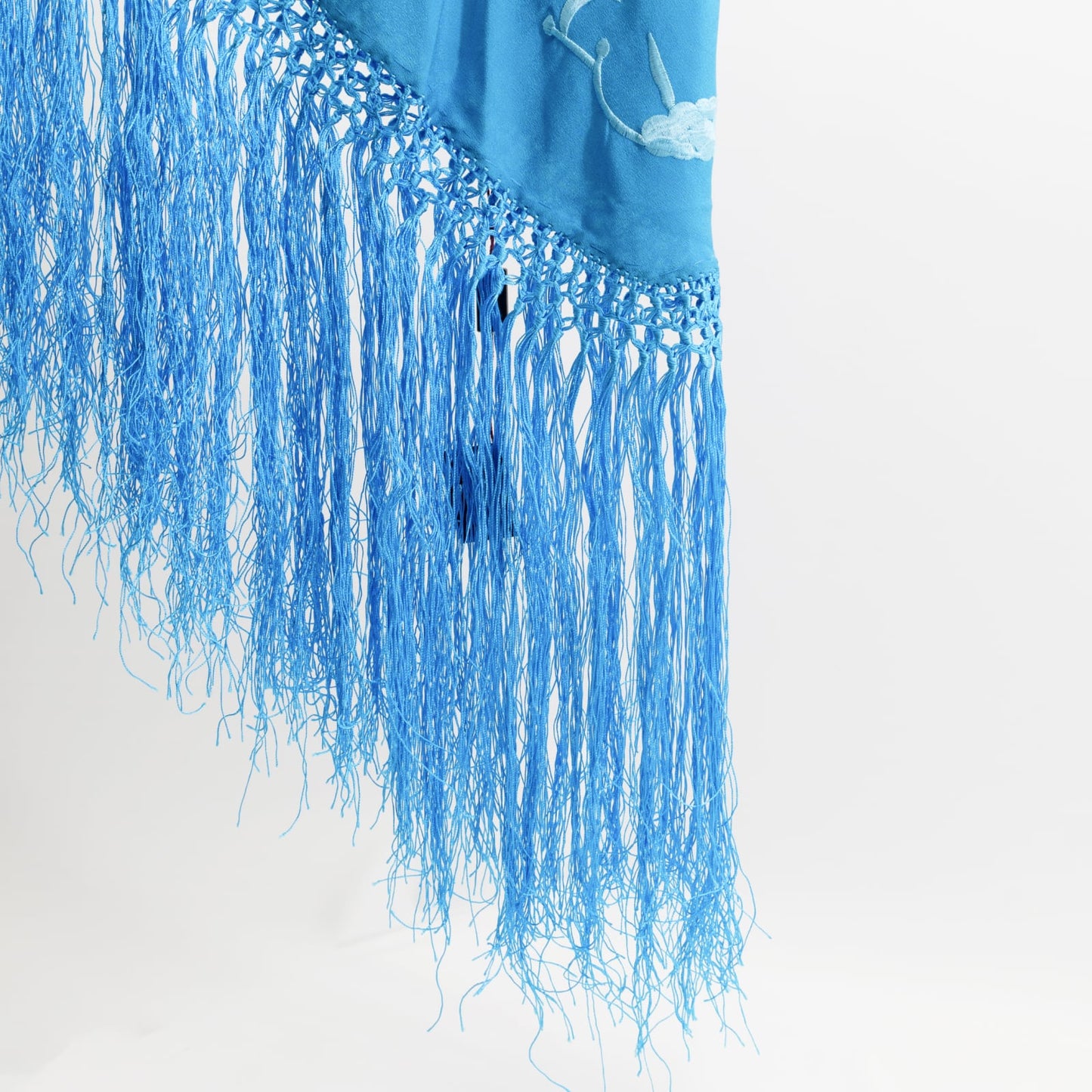 Blue floral embroidered mantoncillo shawl.