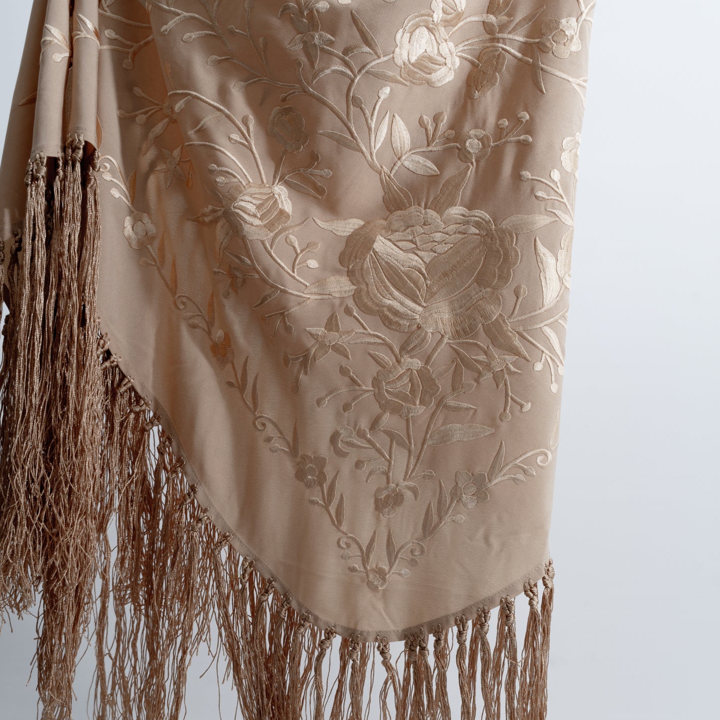 Beige tostado floral embroidered mantoncillo shawl in crespon.