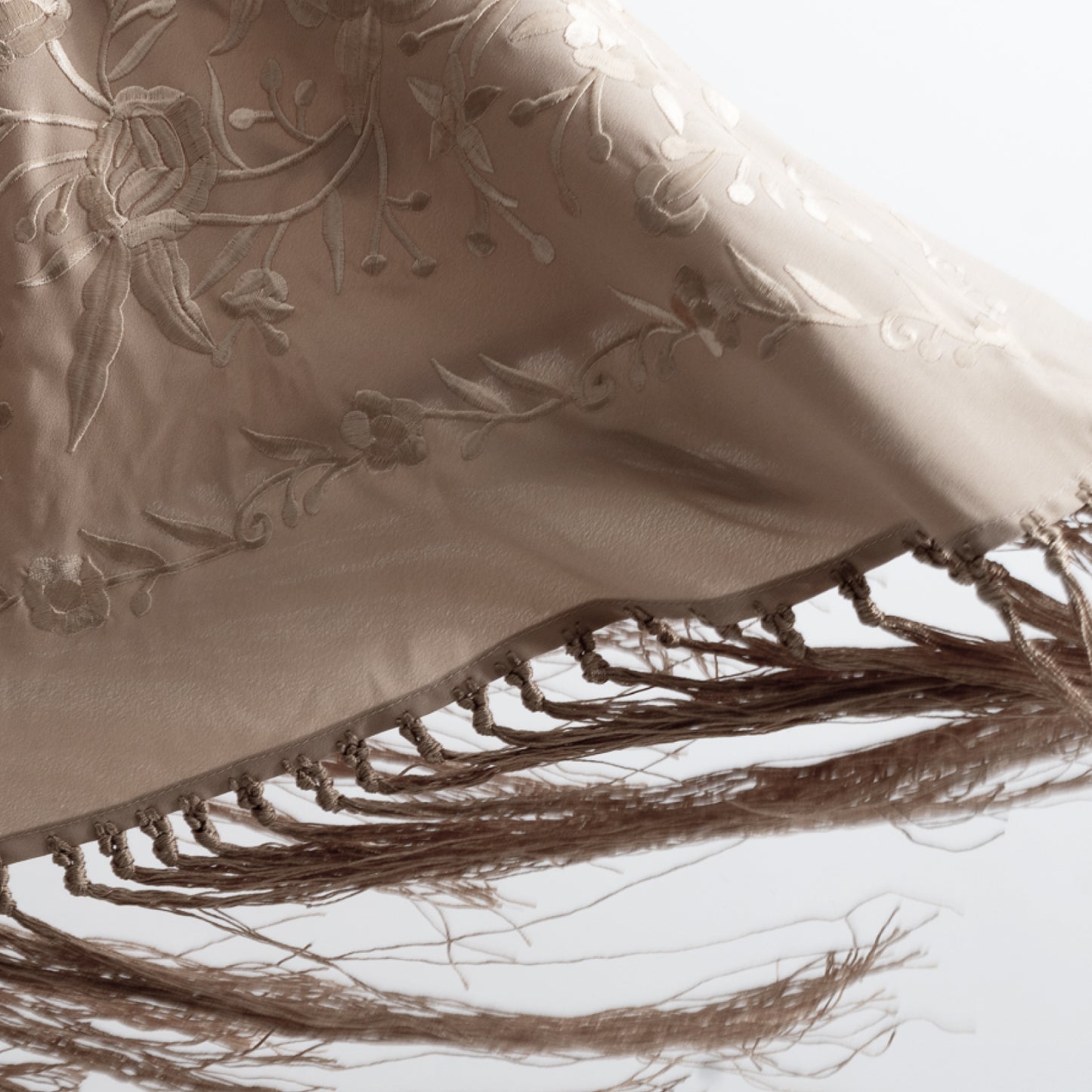 Beige tostado floral embroidered mantoncillo shawl in crespon.