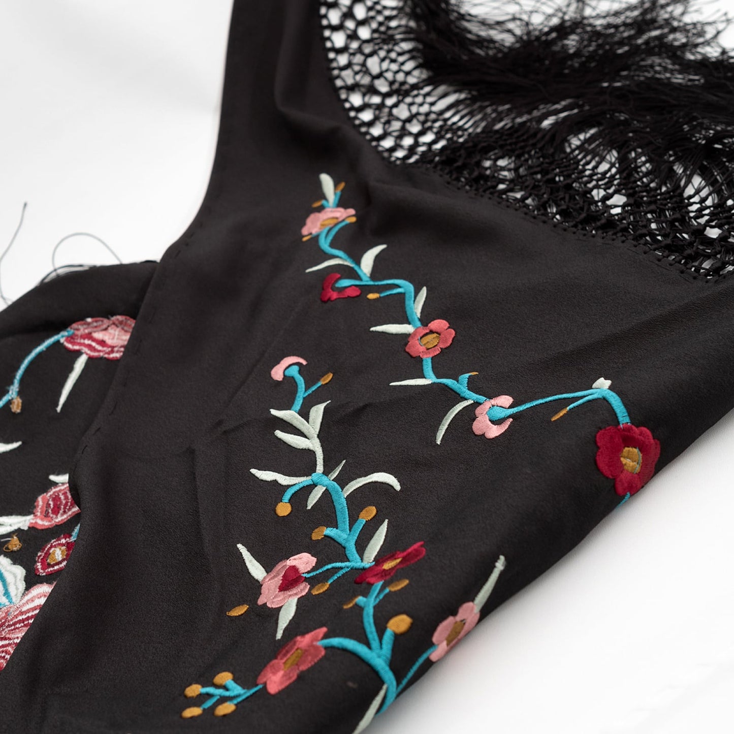Black floral embroidered mantoncillo shawl.
