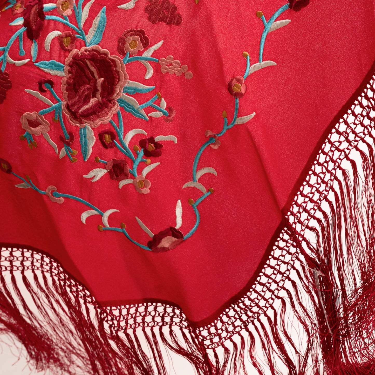 Red floral embroidered mantoncillo shawl.