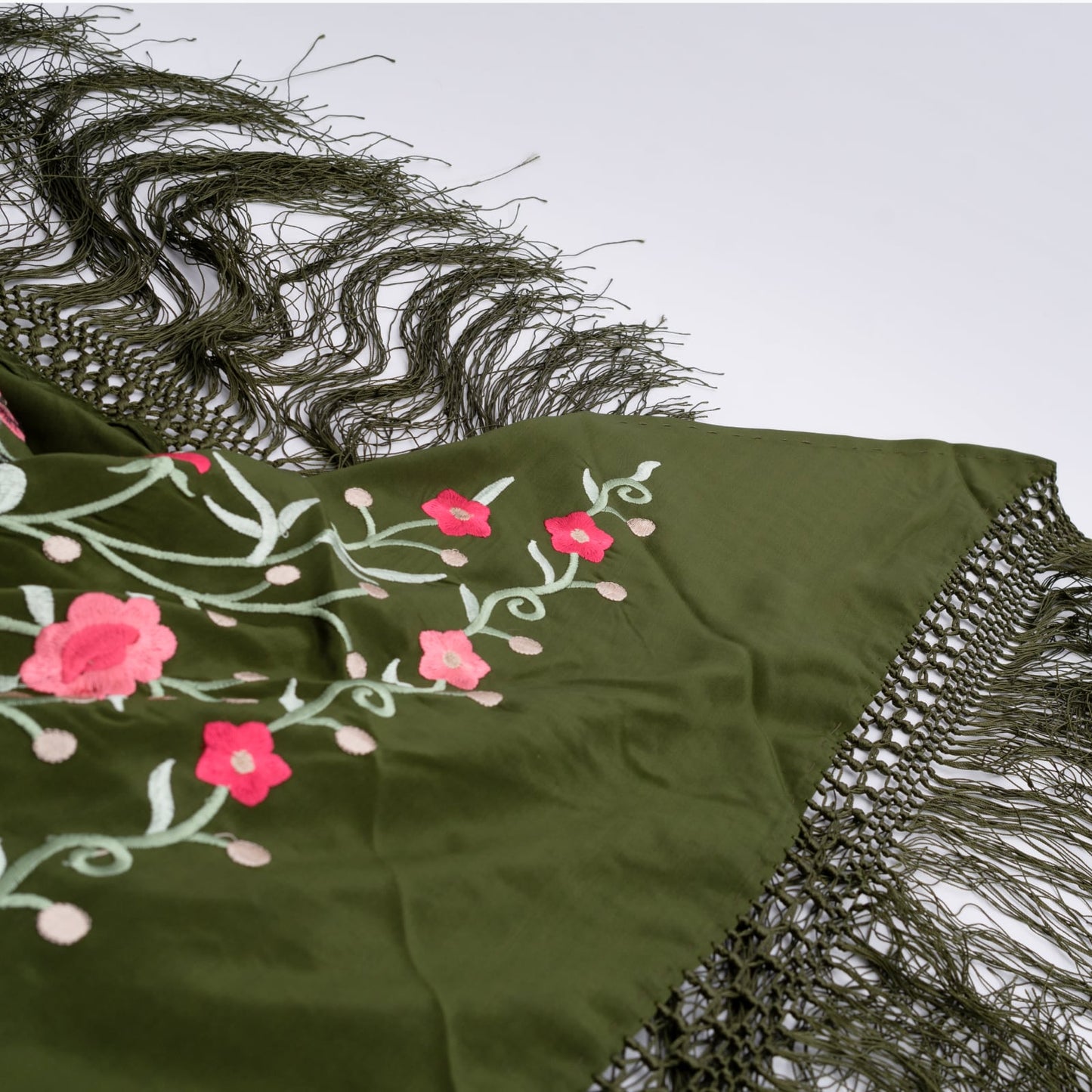 Green olive floral embroidered mantoncillo shawl.
